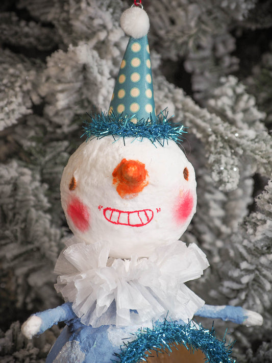 Adorable handmade spun cotton Art Doll Christmas tree ornament by Idania Salcido, the artist by Danita Art. Hand painted by the artist holiday figurine with paper hat with tinsel and vintage style garlands and a tiny Christmas tree. Hang this handmade ornament from your Christmas tree or use as Holiday decoration.