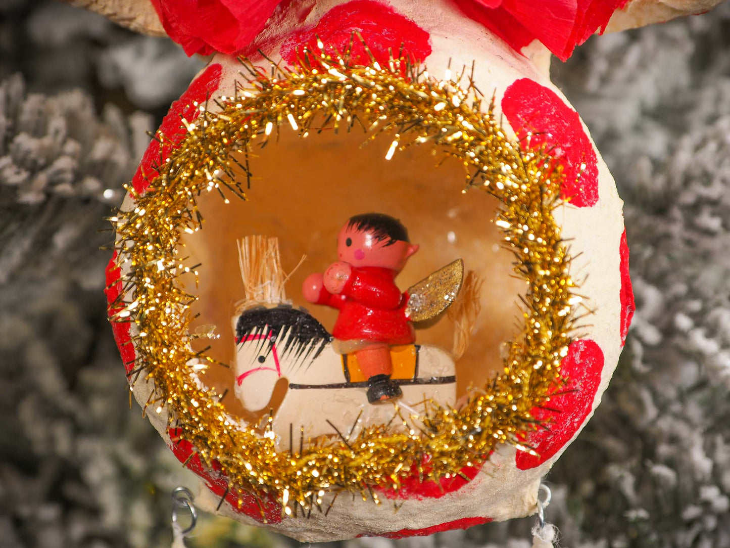 Adorable handmade spun cotton Art Doll Christmas tree ornament by Idania Salcido, the artist by Danita Art. Hand painted by the artist holiday figurine with paper hat with tinsel and vintage style garlands and a tiny Christmas tree. Hang this handmade ornament from your Christmas tree or use as Holiday decoration.