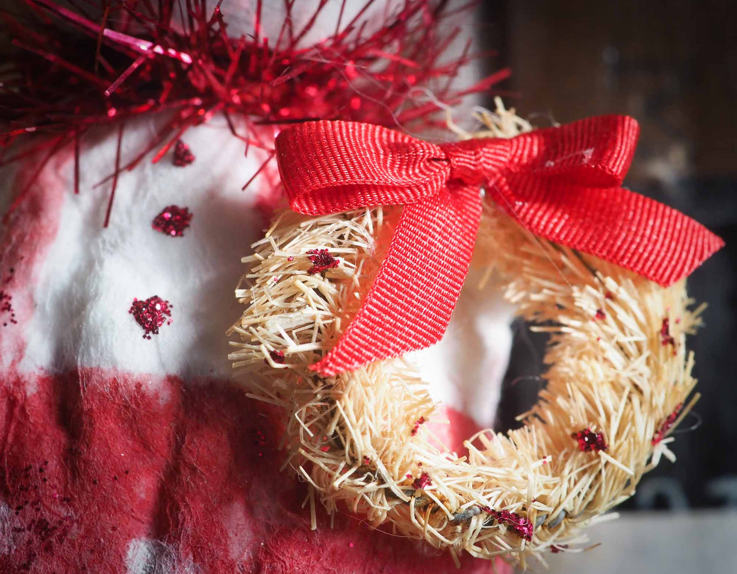 Spun cotton hand made ornament snowman by Danita Art. Made with organic cotton, painted in a vintage, folk art weathered style resembling Christmas tree handmade decorations from 19th century. Has bristle bottle brush tree, and decorative accents with glitter. Ready to hang on vintage tinsel ribbon on Christmas tree.
