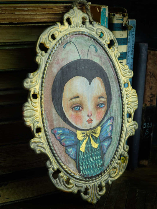 The boy with butterfly wings, painted using Daniel smith watercolors by Danita.