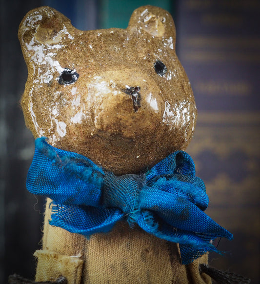 Soft sculpture art doll by Idania Salcido Danita Art with a Handmade ceramics face, organic dyed fabric and silk bow