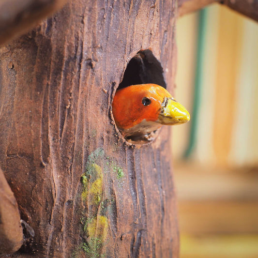 An original handmade piece by Idania Salcido, a wolf tree spirit that protects the forest animals from harm in his loving branches. Great unique decoration.