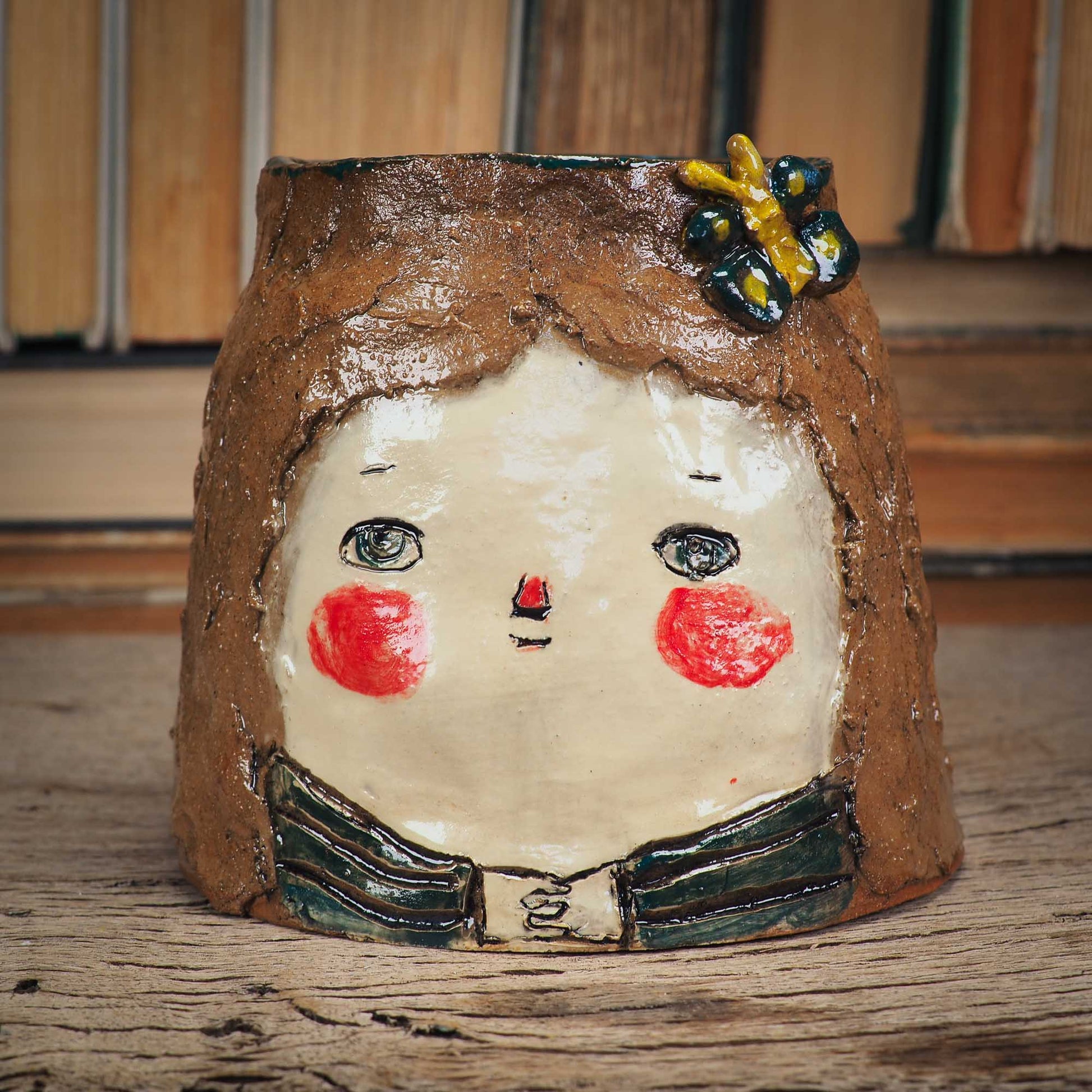 An original handmade ceramic girl container by Idania Salcido Danita Art. She could be a cookie jar, or also a nice succulent plant planter.