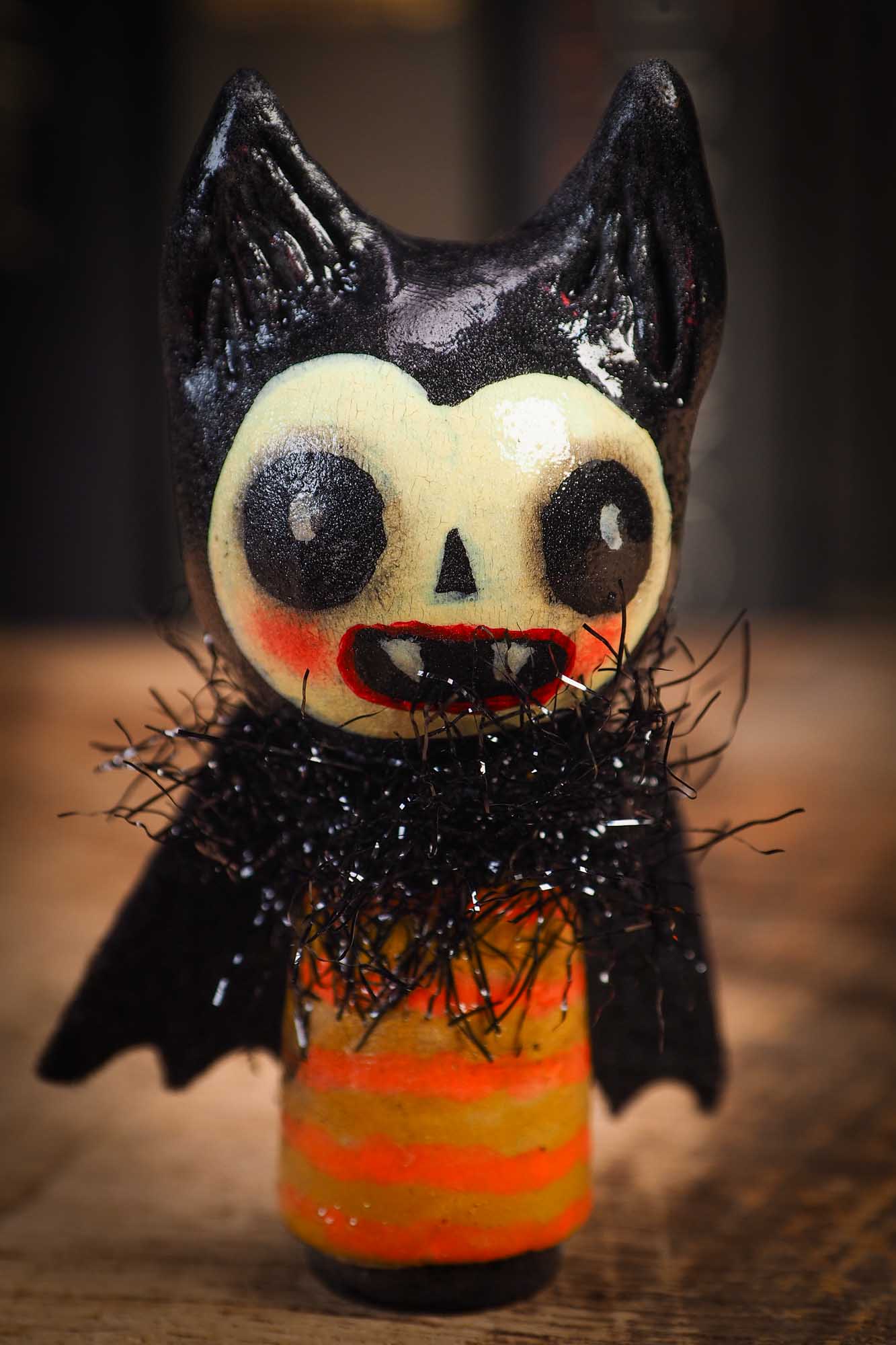 Small Halloween mini kokeshi art doll vampire figurine with sculpted head, fabric cape. Made by Idania Salcido, Danita Art.