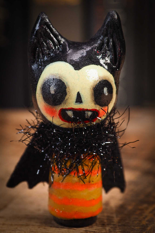 Small Halloween mini kokeshi art doll vampire figurine with sculpted head, fabric cape. Made by Idania Salcido, Danita Art.