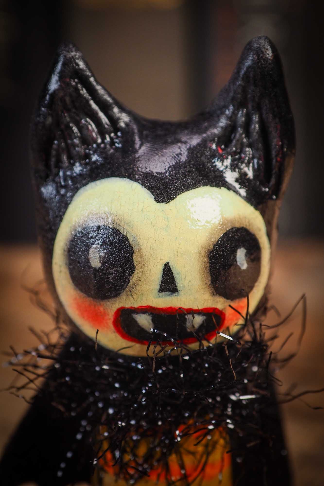 Small Halloween mini kokeshi art doll vampire figurine with sculpted head, fabric cape. Made by Idania Salcido, Danita Art.