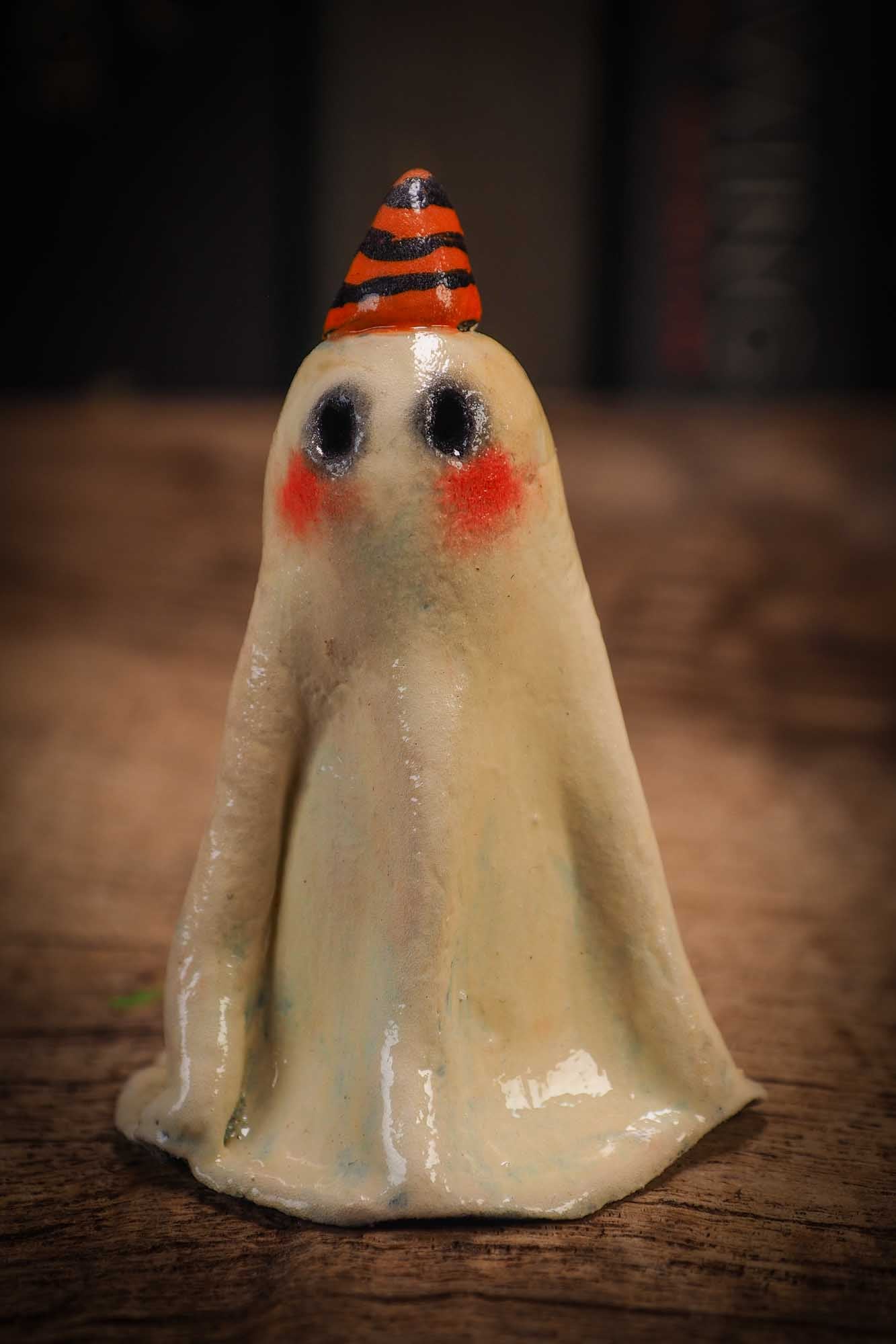 Small Halloween mini kokeshi art doll ghost figurine with sculpted white body. Made by Idania Salcido, Danita Art.