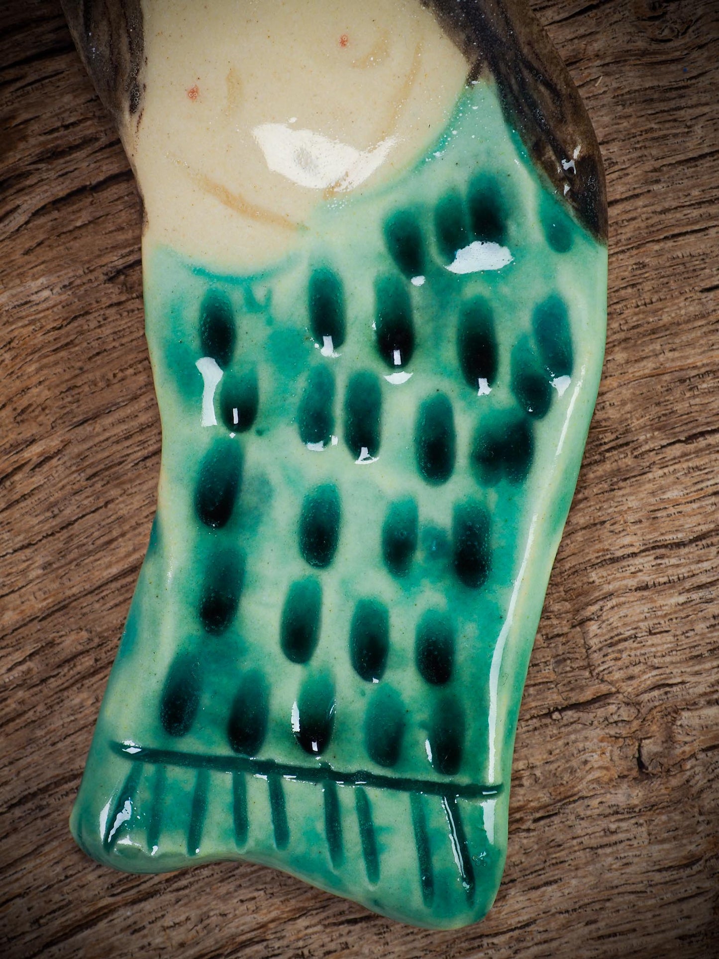 Handmade ceramic mermaid ornament with golden hair and blue-green tail, created by Idania Salcido aka Danita Art for holiday decorating or gifting.