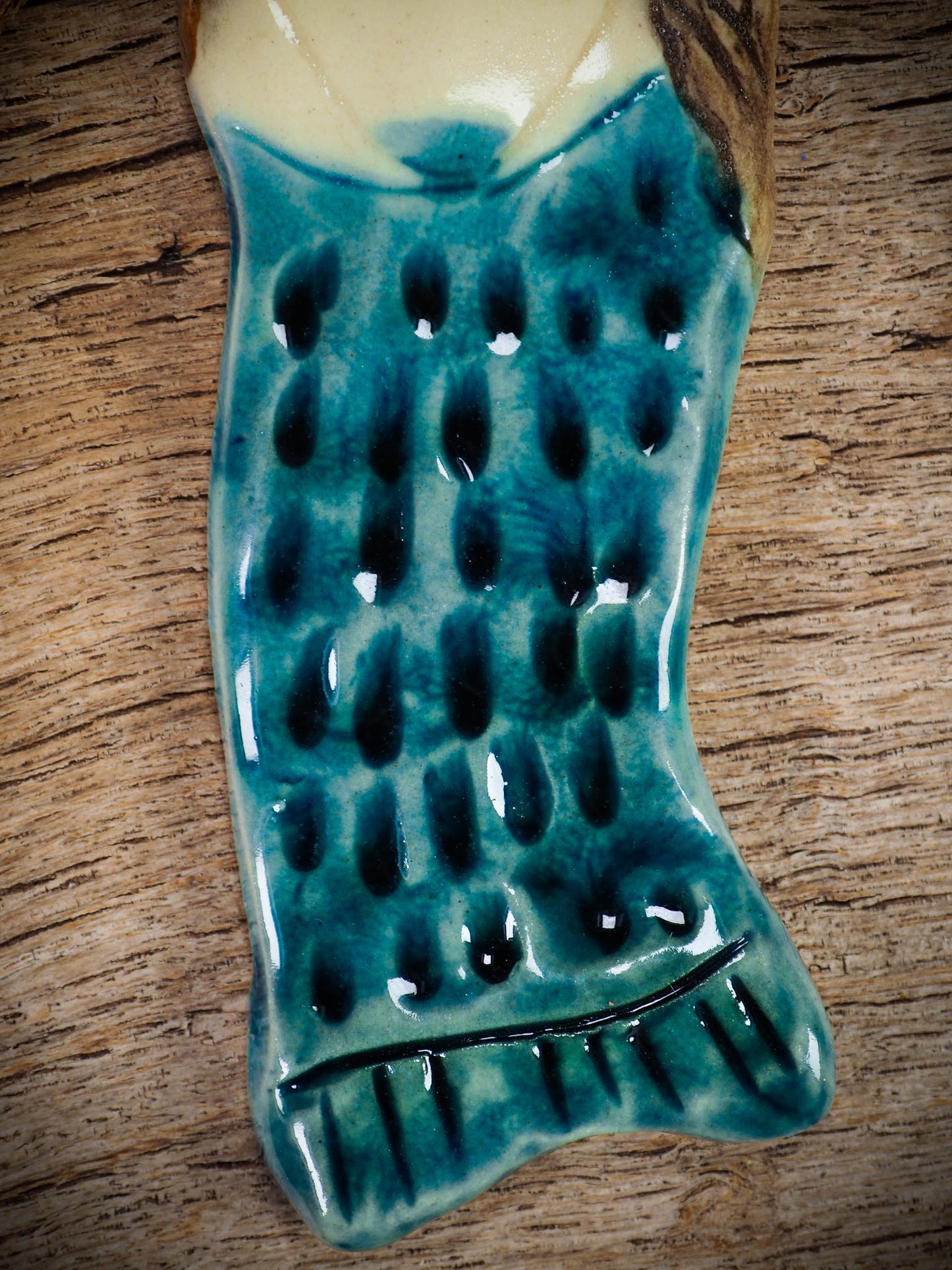 Handmade ceramic mermaid ornament with golden hair and blue-green tail, created by Idania Salcido aka Danita Art for holiday decorating or gifting.