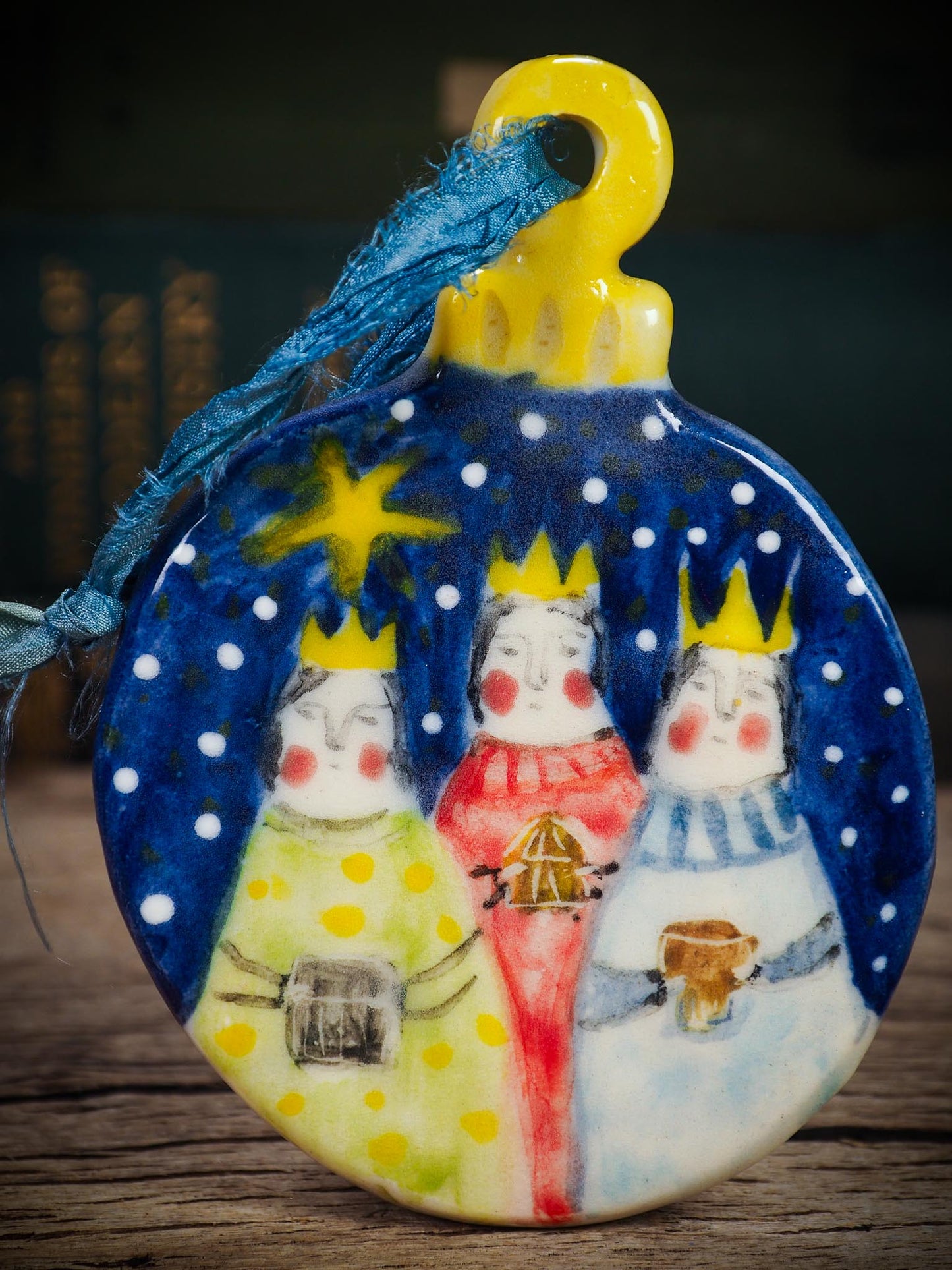 Handmade ceramic Three Wise Kings ornament with guiding star, created by Idania Salcido aka Danita Art for Christmas decorating or gifting.