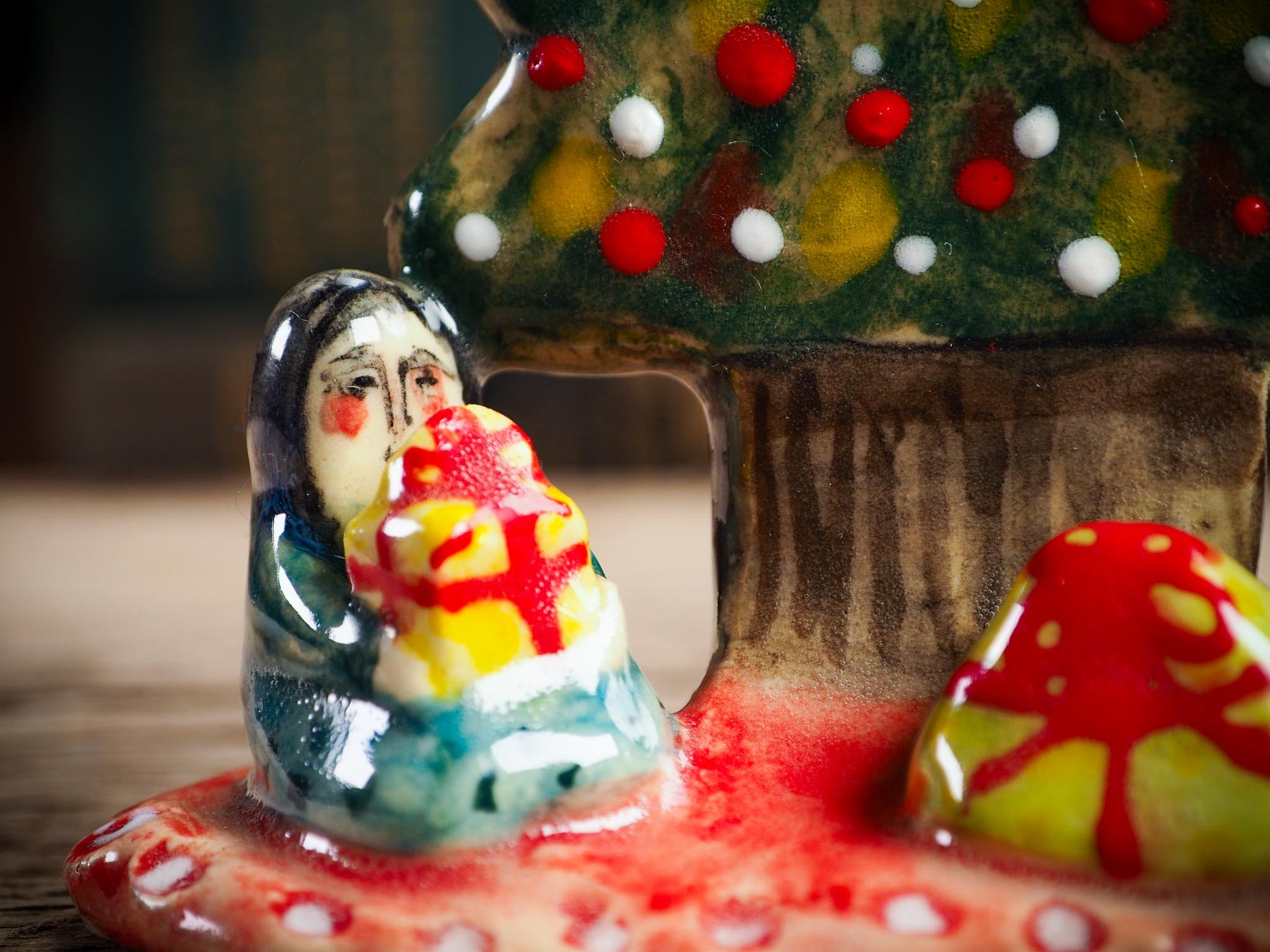 Handmade ceramic Christmas tree scene with child and gifts by Idania Salcido aka Danita Art.