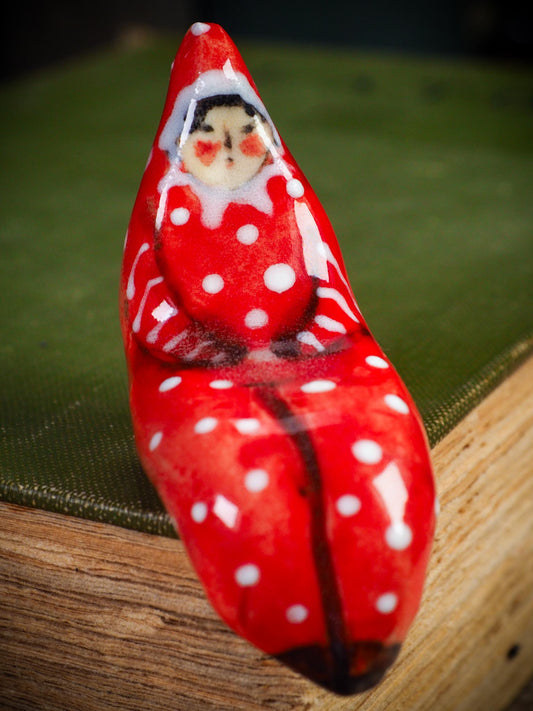 Handmade ceramic red shelf elf companion by Idania Salcido aka Danita Art.