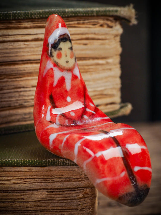 Handmade ceramic red shelf elf companion by Idania Salcido aka Danita Art.