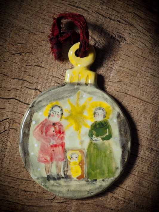 Handmade ceramic nativity ornament with Mary, Joseph, and baby Jesus by Idania Salcido aka Danita Art.