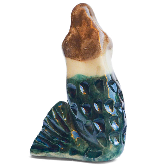Handmade ceramic mermaid totem amulet figurine hand painted by Idania Salcido, the artist behind Danita art. Ceramic simulates carved wood with colorful glazes.