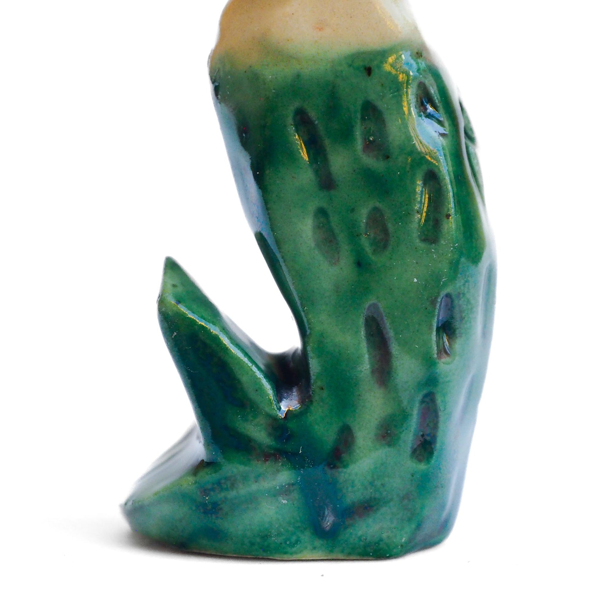 Handmade ceramic mermaid totem amulet figurine hand painted by Idania Salcido, the artist behind Danita art. Ceramic simulates carved wood with colorful glazes.