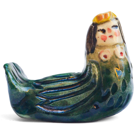 Handmade ceramic mermaid totem amulet figurine hand painted by Idania Salcido, the artist behind Danita art. Ceramic simulates carved wood with colorful glazes.