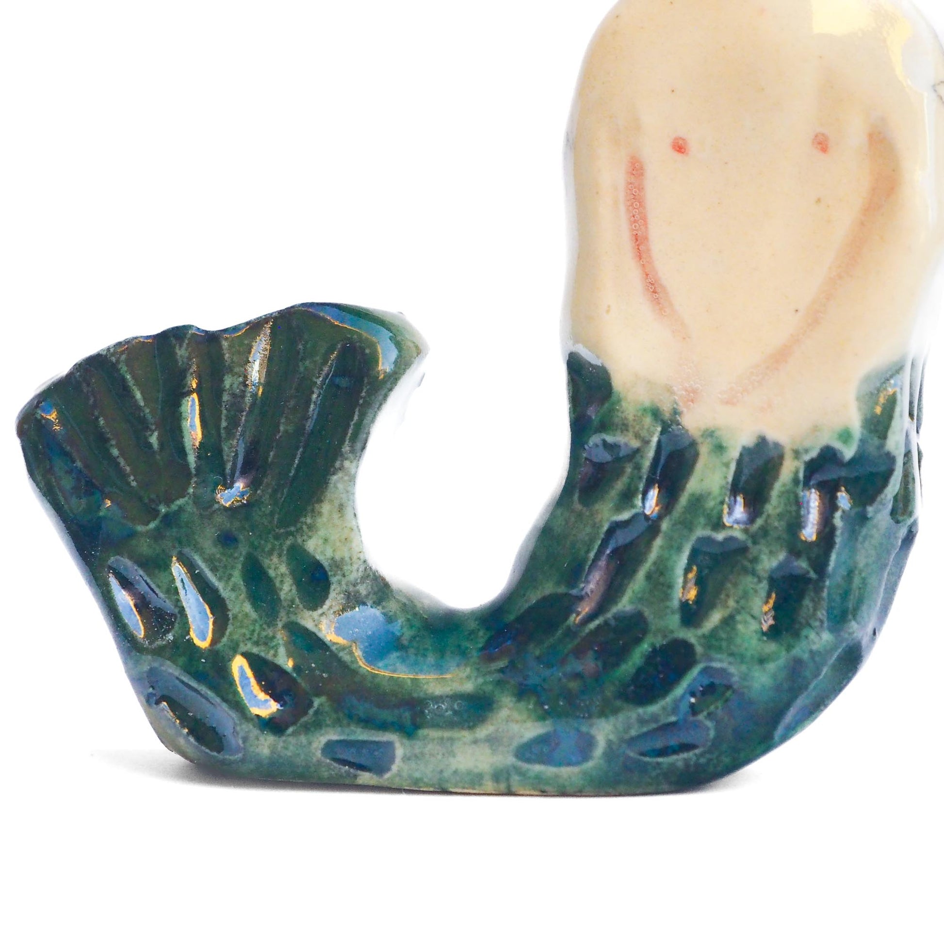 Handmade ceramic mermaid totem amulet figurine hand painted by Idania Salcido, the artist behind Danita art. Ceramic simulates carved wood with colorful glazes.