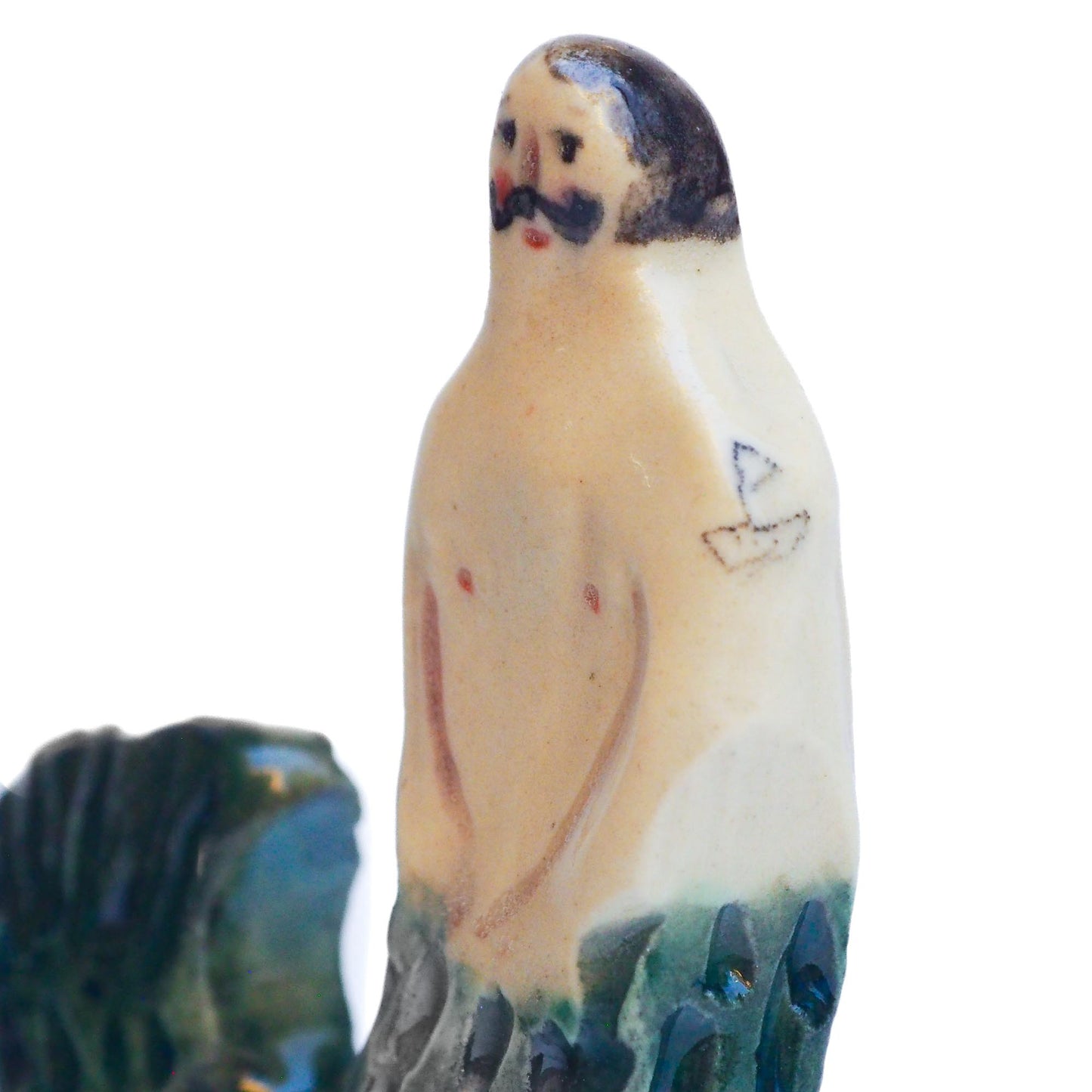 Handmade ceramic mermaid totem amulet figurine hand painted by Idania Salcido, the artist behind Danita art. Ceramic simulates carved wood with colorful glazes.