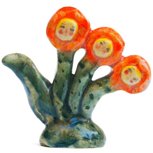Handmade ceramic flower totem amulet figurine hand painted by Idania Salcido, the artist behind Danita art. Ceramic simulates carved wood with colorful glazes.