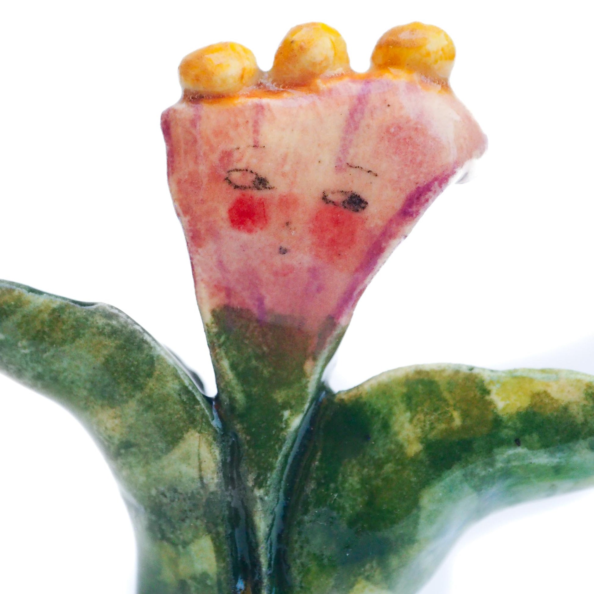 Handmade ceramic flower totem amulet figurine hand painted by Idania Salcido, the artist behind Danita art. Ceramic simulates carved wood with colorful glazes.