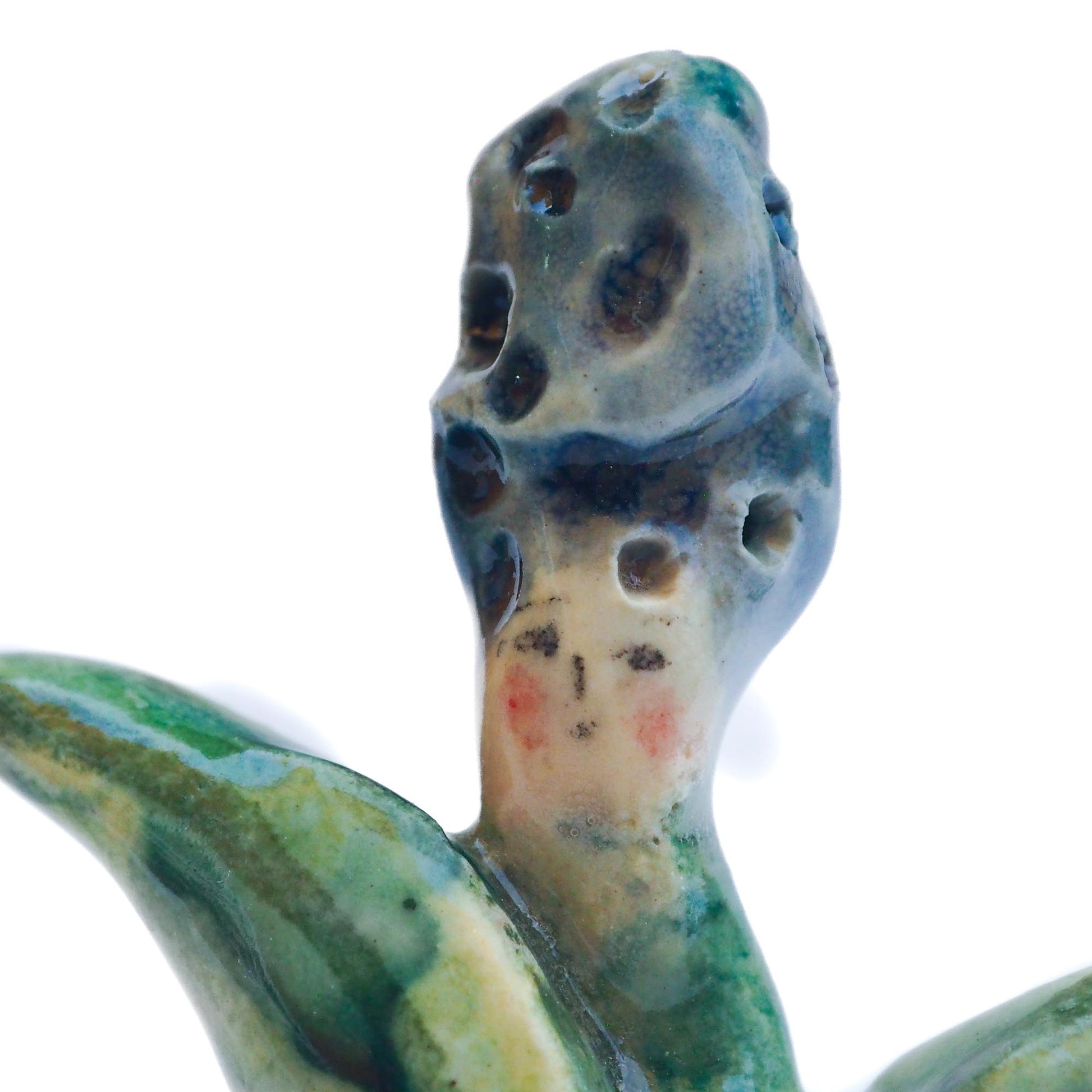 Handmade ceramic flower totem amulet figurine hand painted by Idania Salcido, the artist behind Danita art. Ceramic simulates carved wood with colorful glazes.