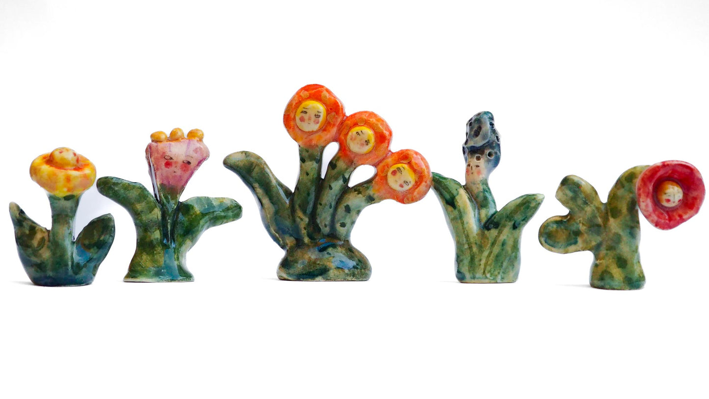 Handmade ceramic flower totem amulet figurine hand painted by Idania Salcido, the artist behind Danita art. Ceramic simulates carved wood with colorful glazes.