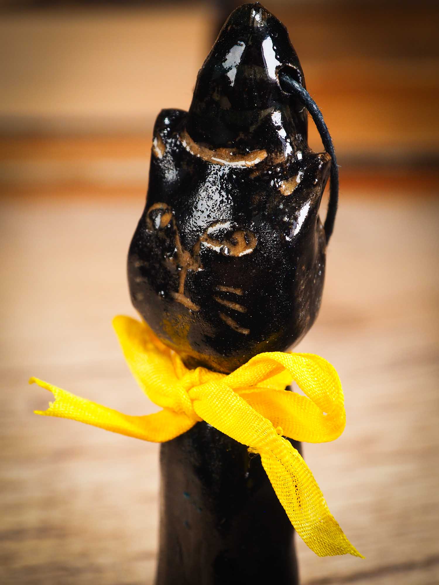 Original handmade ceramic black cat ornament by Idania Salcido Danita Art with silk bow is perfect Halloween decoration! Stands on its own or hangs from window.