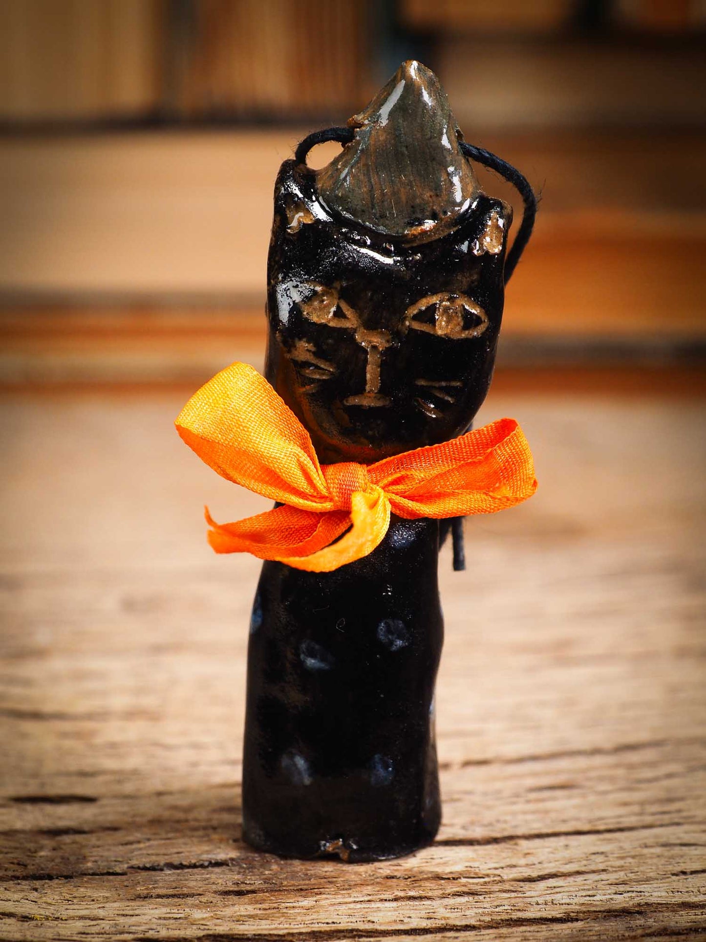 Original handmade ceramic black cat ornament by Idania Salcido Danita Art with silk bow is perfect Halloween decoration! Stands on its own or hangs from window.
