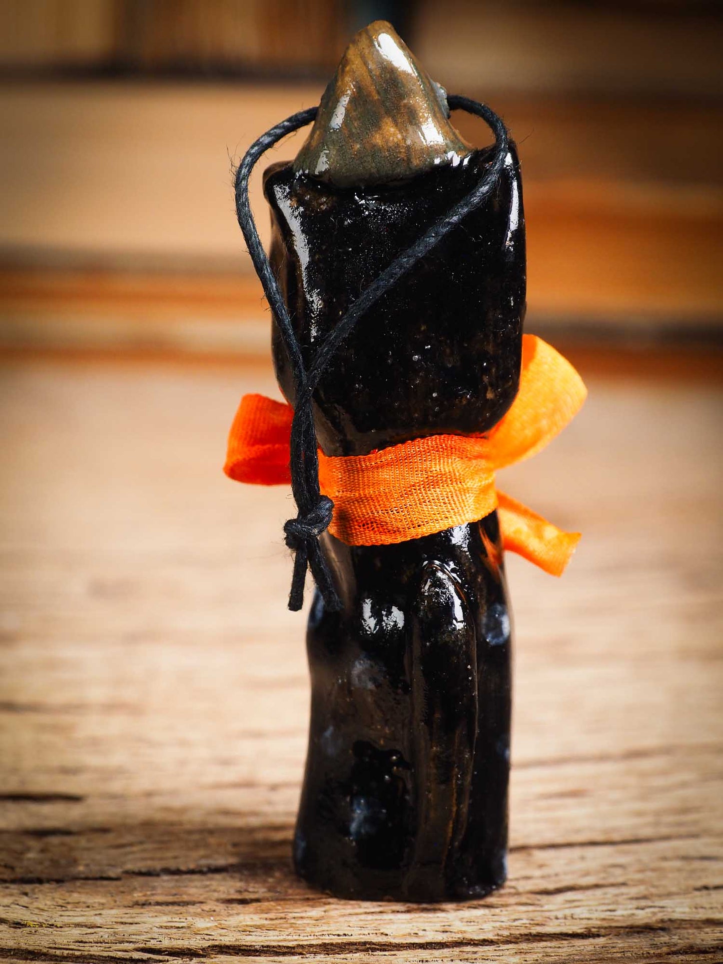Original handmade ceramic black cat ornament by Idania Salcido Danita Art with silk bow is perfect Halloween decoration! Stands on its own or hangs from window.