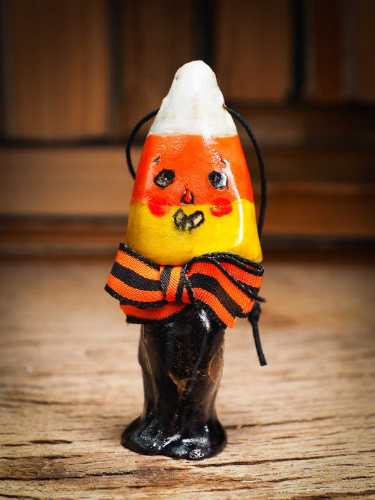 Original handmade ceramic candy corn ornament by Idania Salcido Danita Art with silk bow is perfect Halloween decoration! Stands on its own or hangs from window
