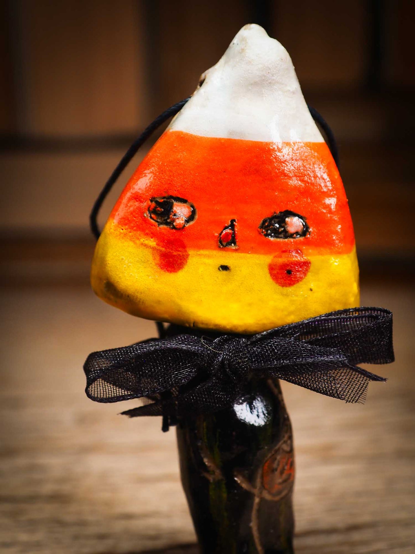 Original handmade ceramic candy corn ornament by Idania Salcido Danita Art with silk bow is perfect Halloween decoration! Stands on its own or hangs from window
