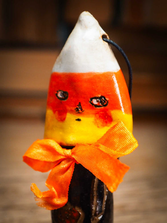 Original handmade ceramic candy corn ornament by Idania Salcido Danita Art with silk bow is perfect Halloween decoration! Stands on its own or hangs from window