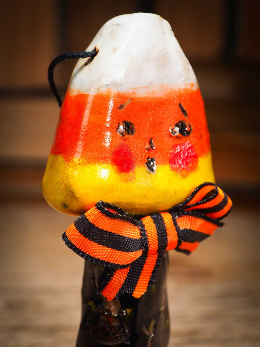 Original handmade ceramic candy corn ornament by Idania Salcido Danita Art with silk bow is perfect Halloween decoration! Stands on its own or hangs from window