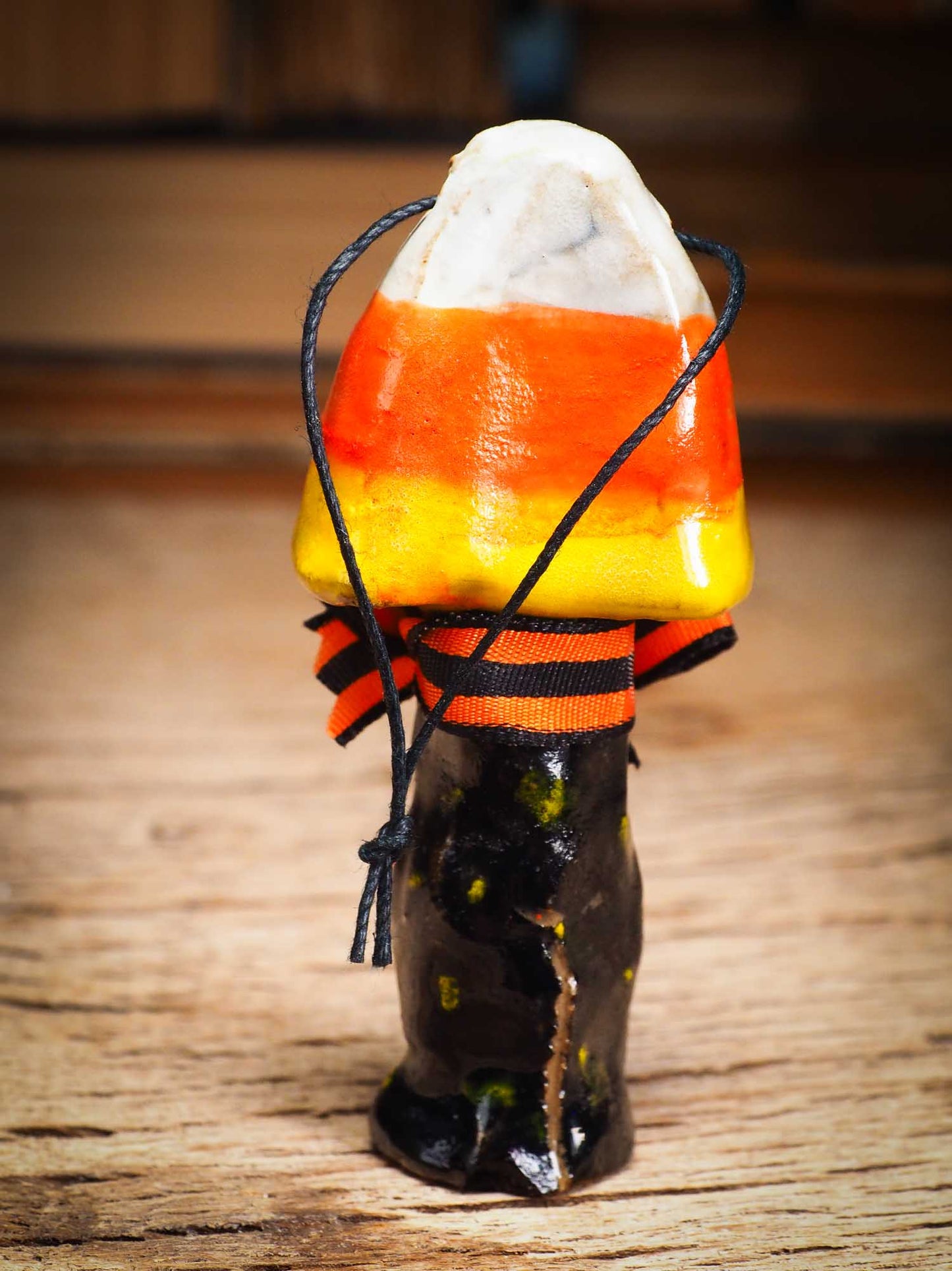 Original handmade ceramic candy corn ornament by Idania Salcido Danita Art with silk bow is perfect Halloween decoration! Stands on its own or hangs from window