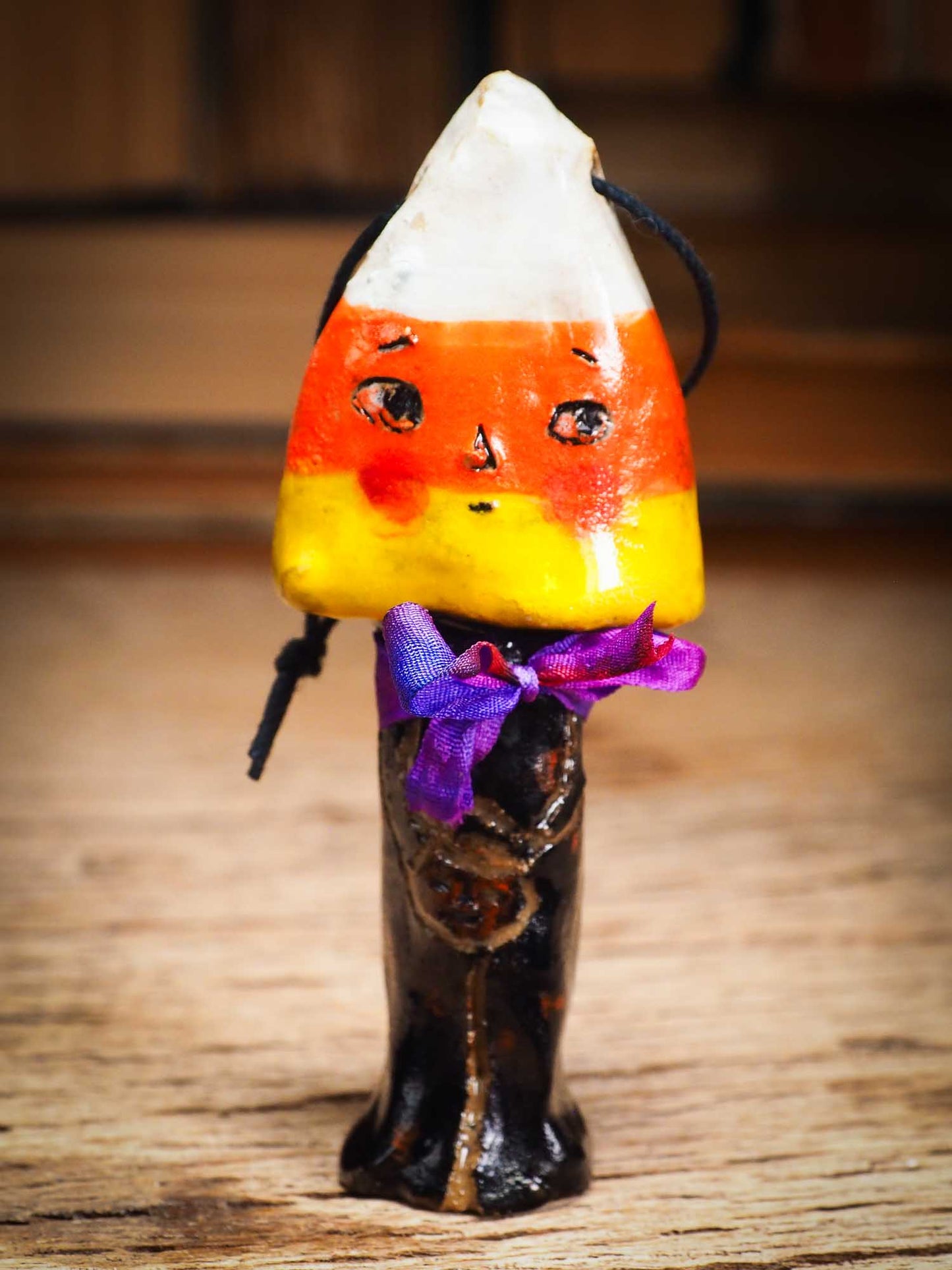 Original handmade ceramic candy corn ornament by Idania Salcido Danita Art with silk bow is perfect Halloween decoration! Stands on its own or hangs from window