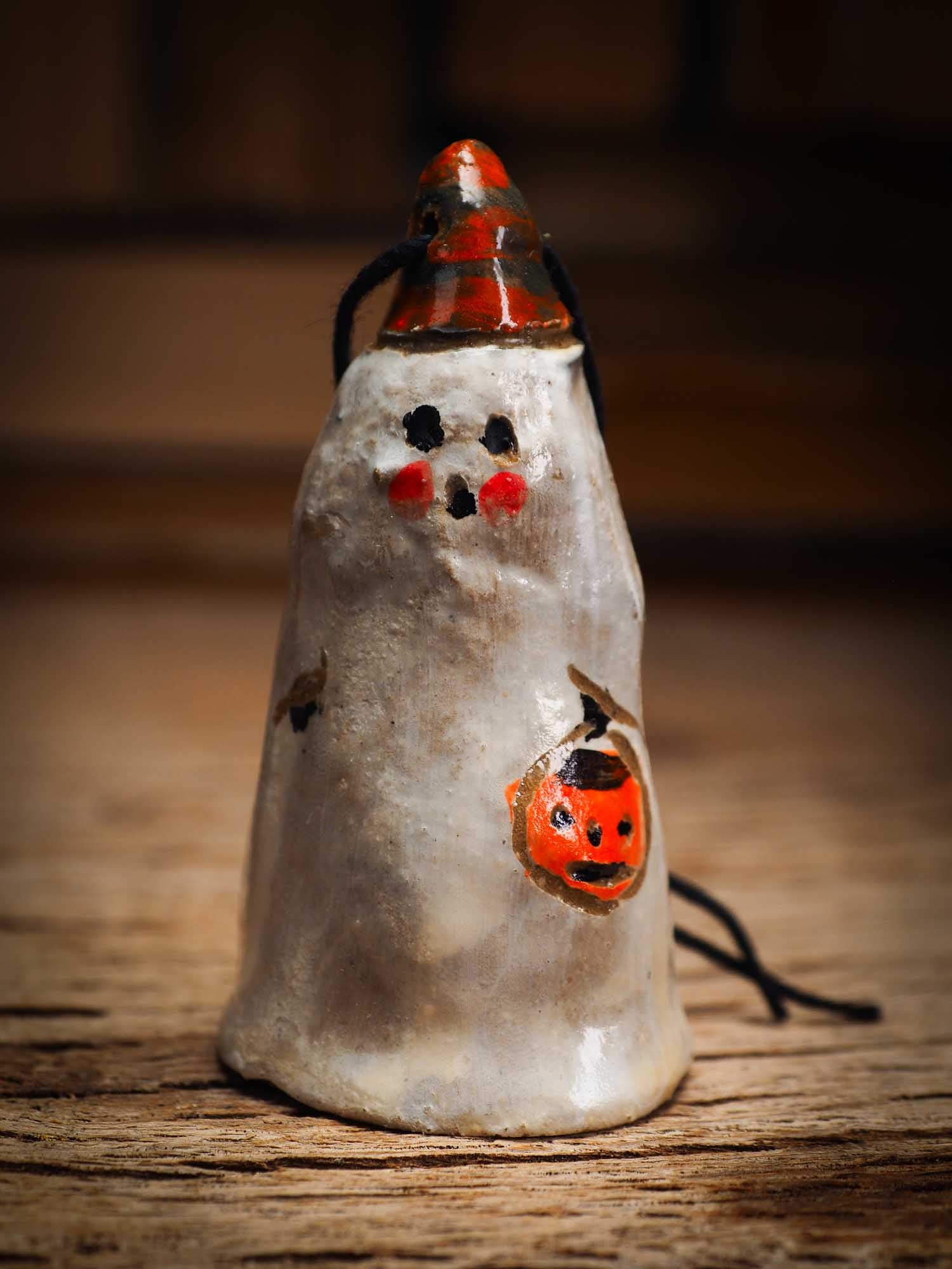 Original handmade ceramic sheet ghost ornament by Idania Salcido Danita Art with thread is perfect Halloween decoration! Stands on its own or hangs from window