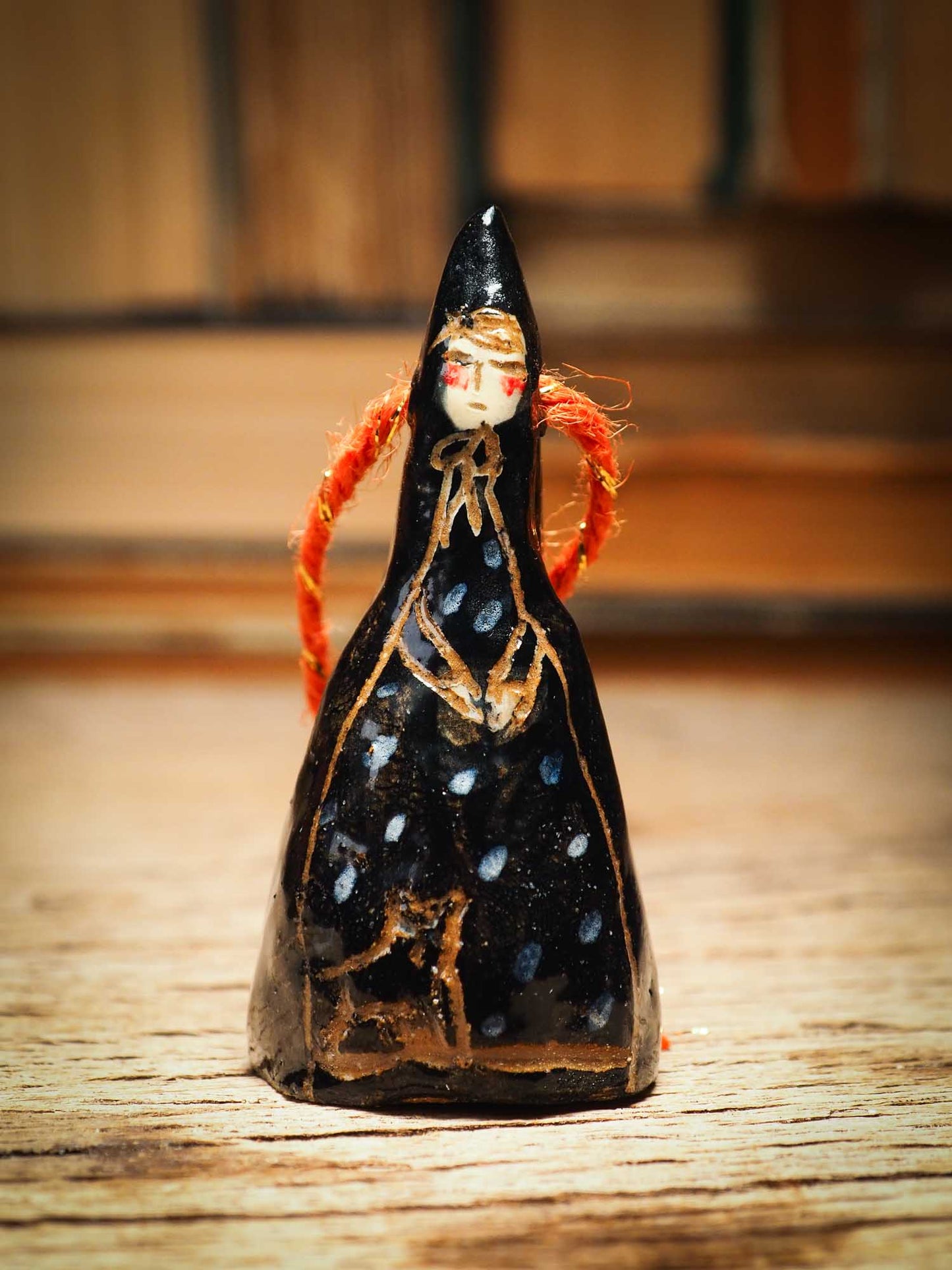 Original handmade ceramic black witch ornament by Idania Salcido Danita Art with thread is perfect Halloween decoration! Stands on its own or hangs from window