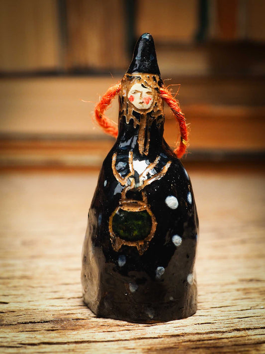 Original handmade ceramic black witch ornament by Idania Salcido Danita Art with thread is perfect Halloween decoration! Stands on its own or hangs from window