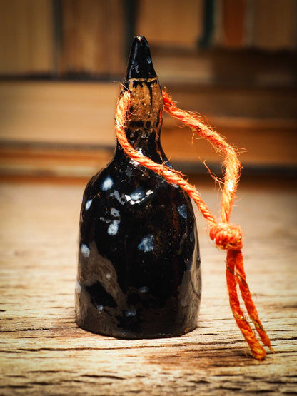 Original handmade ceramic black witch ornament by Idania Salcido Danita Art with thread is perfect Halloween decoration! Stands on its own or hangs from window