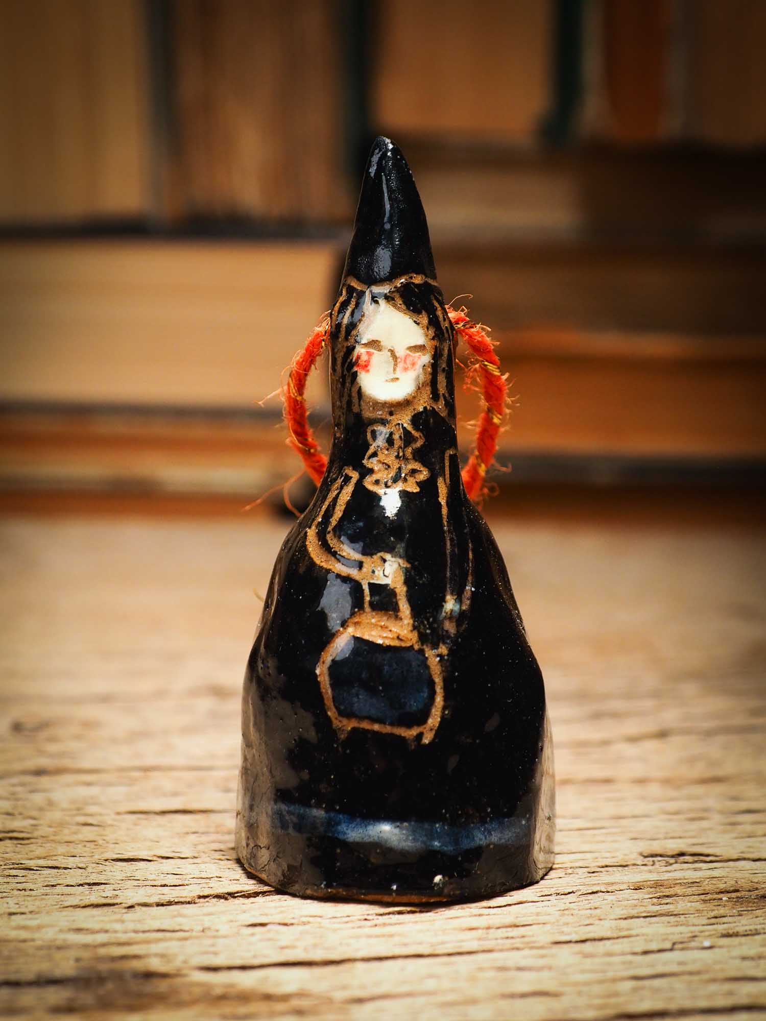Original handmade ceramic black witch ornament by Idania Salcido Danita Art with thread is perfect Halloween decoration! Stands on its own or hangs from window