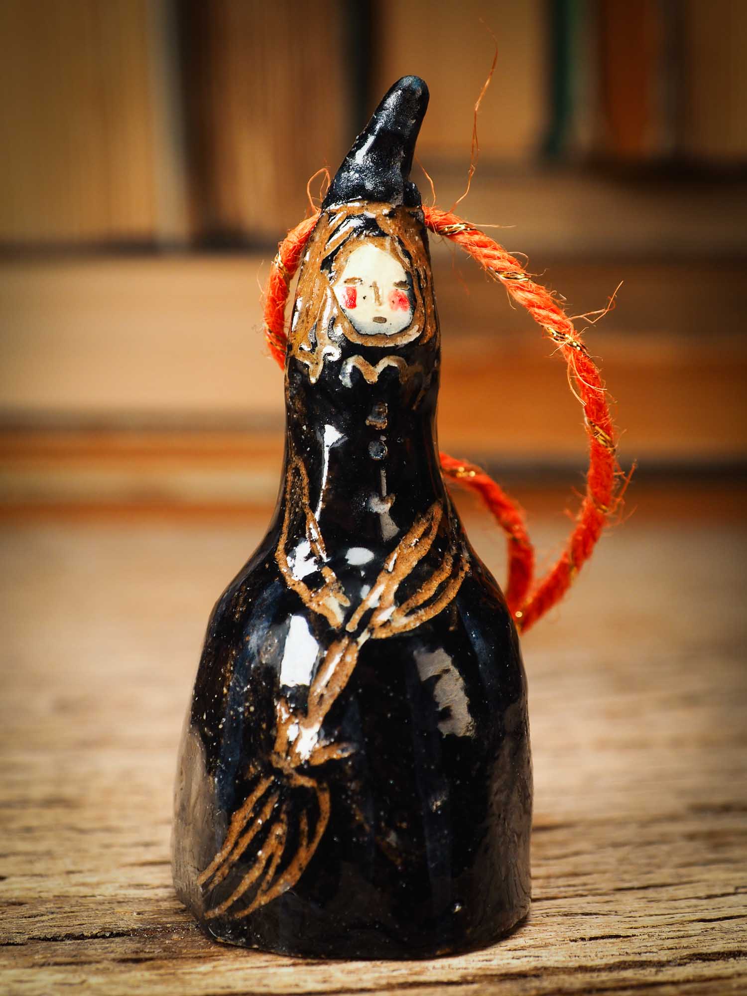 Original handmade ceramic black witch ornament by Idania Salcido Danita Art with thread is perfect Halloween decoration! Stands on its own or hangs from window