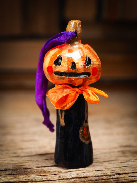 Original handmade ceramic jack-o-lantern pumpkin ornament by Idania Salcido Danita Art is a perfect Halloween decoration! Stands on its own or hangs from window