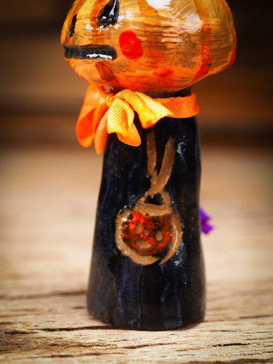 Original handmade ceramic jack-o-lantern pumpkin ornament by Idania Salcido Danita Art is a perfect Halloween decoration! Stands on its own or hangs from window