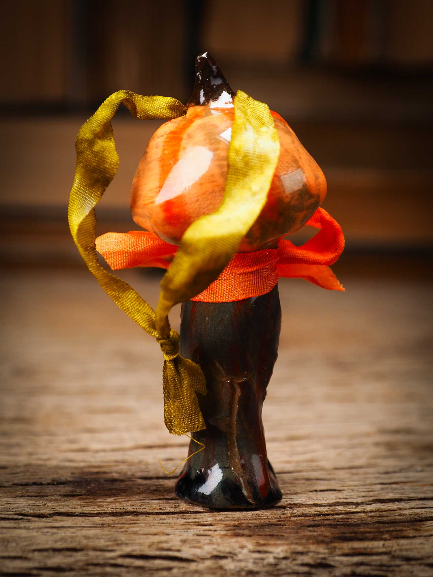 Original handmade ceramic jack-o-lantern pumpkin ornament by Idania Salcido Danita Art is a perfect Halloween decoration! Stands on its own or hangs from window