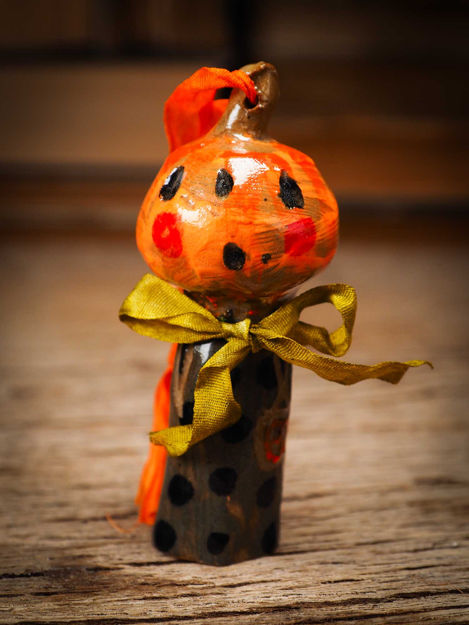 Original handmade ceramic jack-o-lantern pumpkin ornament by Idania Salcido Danita Art is a perfect Halloween decoration! Stands on its own or hangs from window