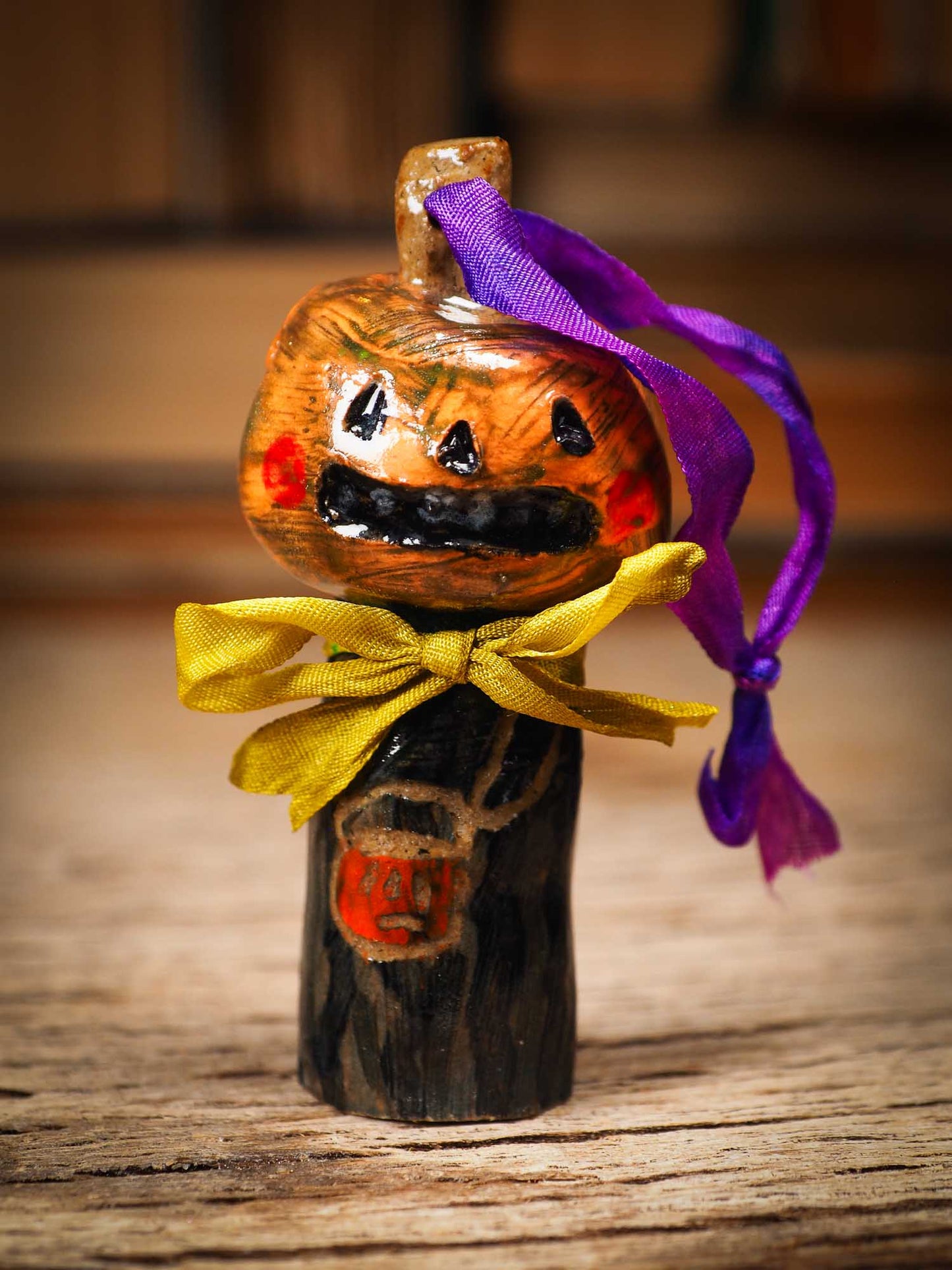 Original handmade ceramic jack-o-lantern pumpkin ornament by Idania Salcido Danita Art is a perfect Halloween decoration! Stands on its own or hangs from window