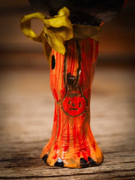 Original handmade ceramic jack-o-lantern pumpkin ornament by Idania Salcido Danita Art is a perfect Halloween decoration! Stands on its own or hangs from window