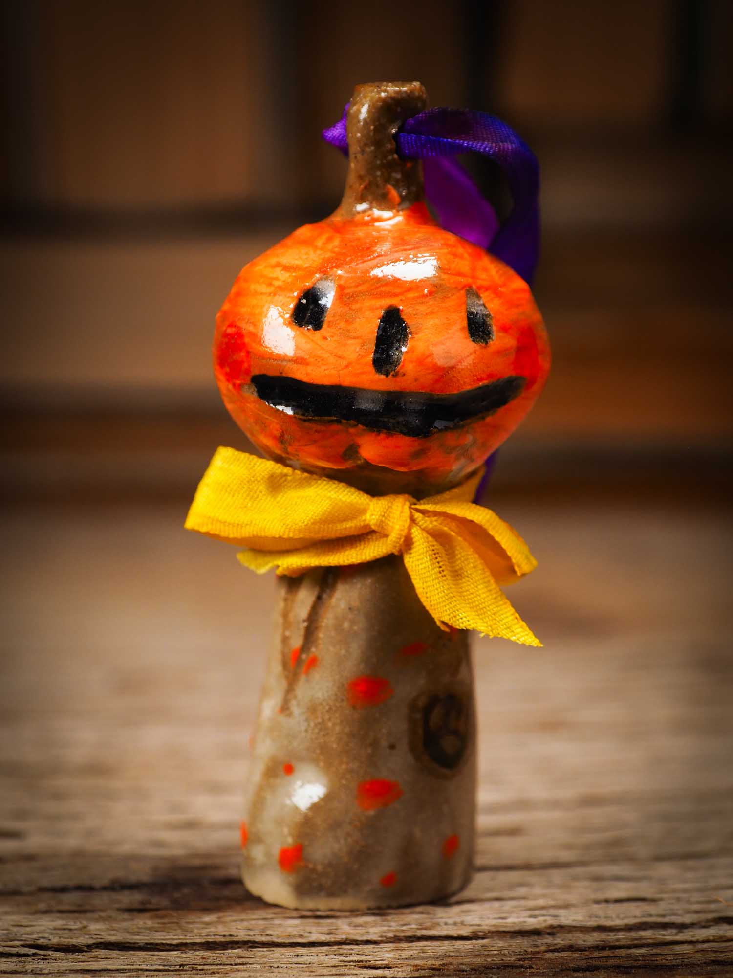Original handmade ceramic jack-o-lantern pumpkin ornament by Idania Salcido Danita Art is a perfect Halloween decoration! Stands on its own or hangs from window