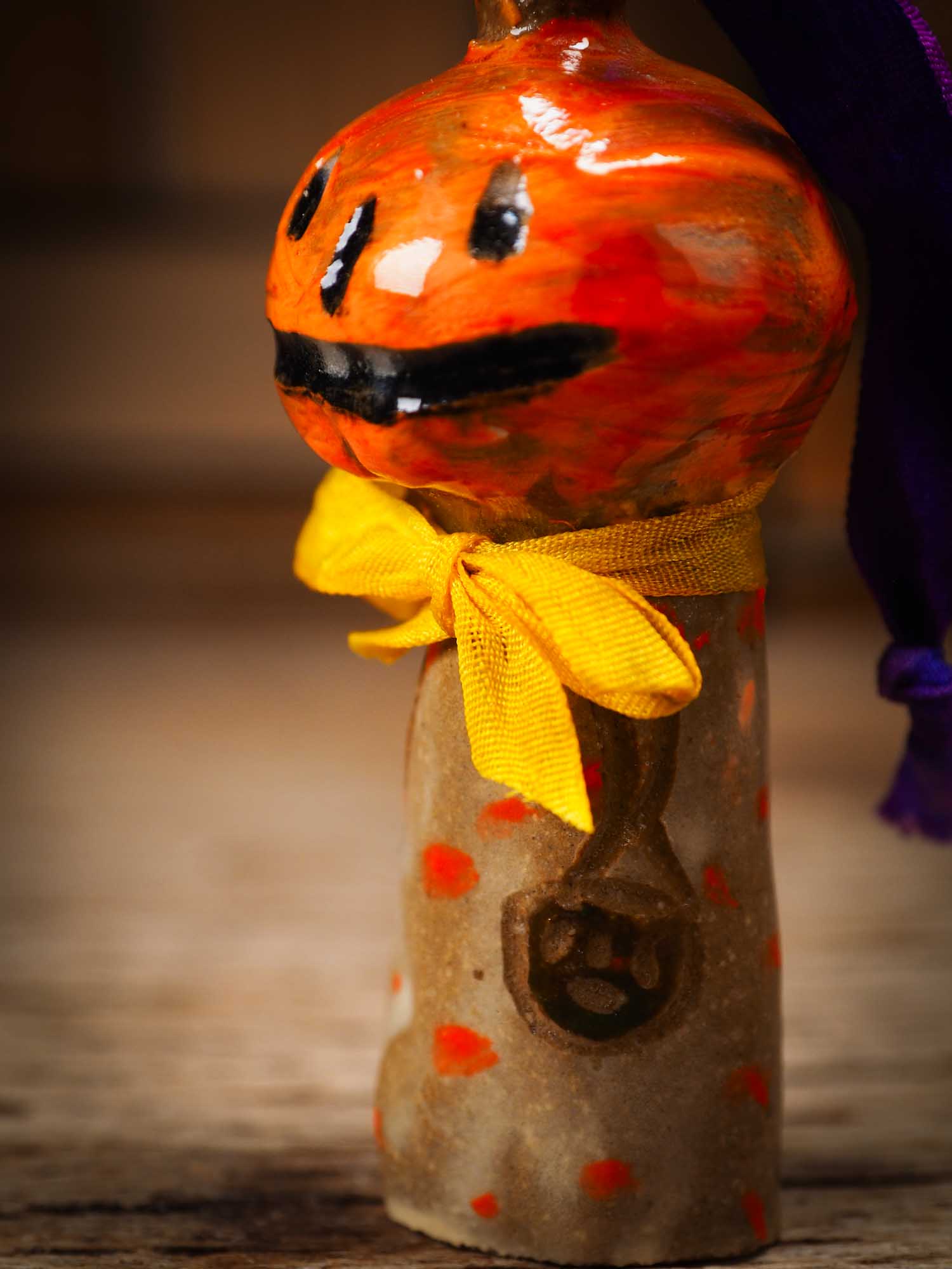 Original handmade ceramic jack-o-lantern pumpkin ornament by Idania Salcido Danita Art is a perfect Halloween decoration! Stands on its own or hangs from window